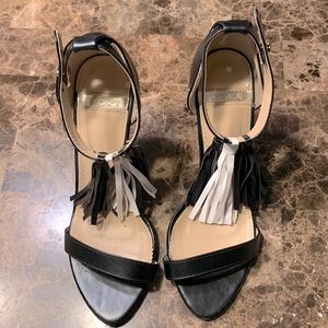 Yoki black size 8.5 high heel (3in) shoe.